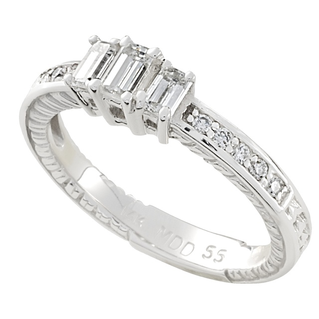 Three Stone Emerald Cut Diamond Ring With Side Diamonds And Engraving With Lucida/Trellis Prongs